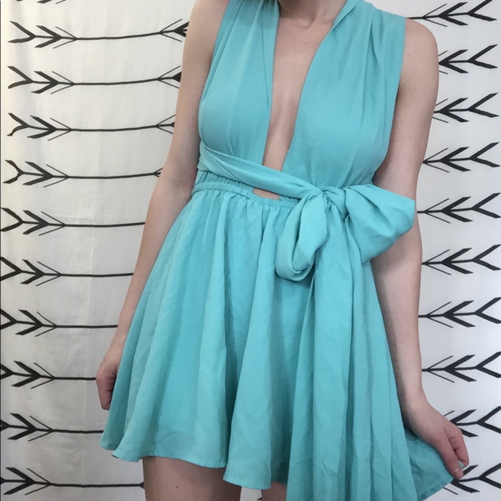 Blue / green wrap romper, never worn! Small